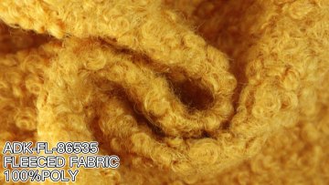 High quality Wholesale Warmth Teddy Fluffy Boucle Imitation Fur Fabric For winter garment1
