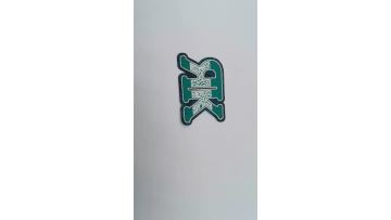 Sporty style woven layer silicone label