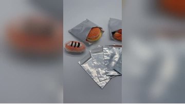 Outer aluminum foil kraft paper bag shows functional video
