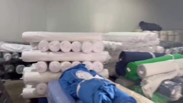 A warehouse where cloth is stacked