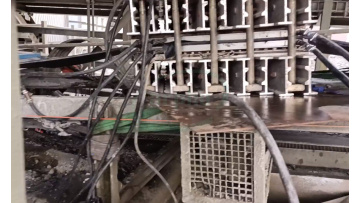 Water cooled conveyor belt vulcanizer