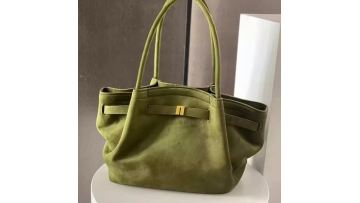 Olive green suede handbag with gold hardware
