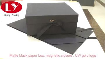 Black magnetic gift box with ribbon