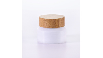 White glass lotion bottle with bamboo lid