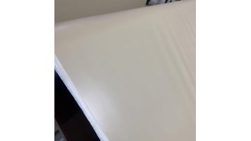 Livite 680GSM dark beige matte PVC high quality coating tarpaulin materials is in production.