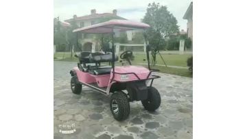 Four-seat pink electric cross-country golf cart.mp4