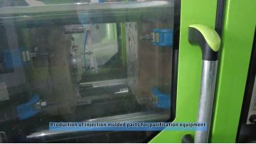 Production of injection molded parts for