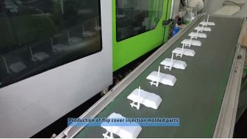 Production of flip cover injection molded parts