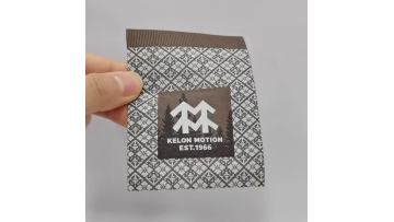 Patterned woven base with silicone printing label
