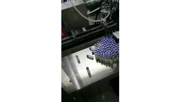 Small bottle filling and sealing machine