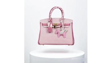 Lady's light pink genuine leather handbag