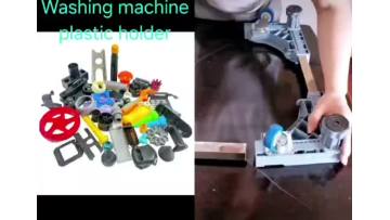 Washing machine plastic holder