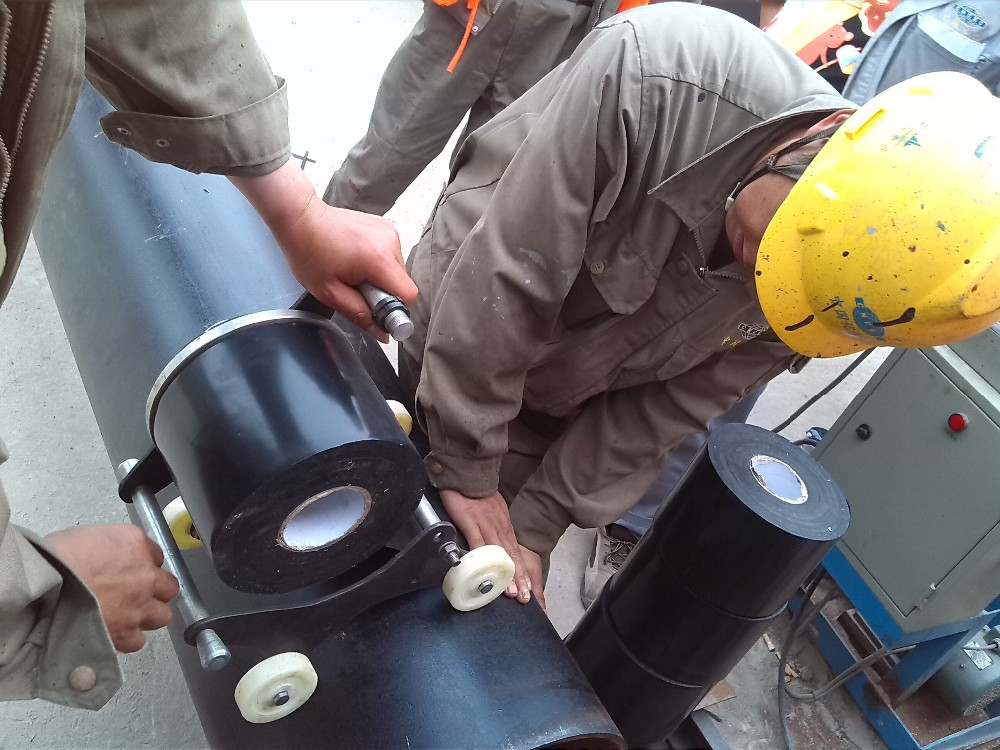 Full automatic pipe wrapping machine for anticorrasion tape