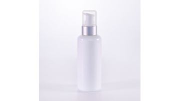 White glass lotion bottle with sliver pump