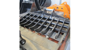 Excavator matching soil loosening rake