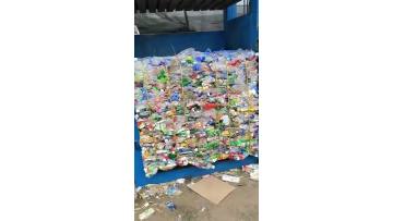 Vertical  plastic baler