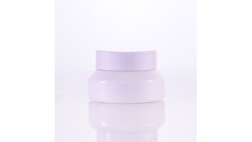 White cream jar with white plastic cap