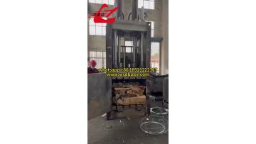 Vertical tie baler