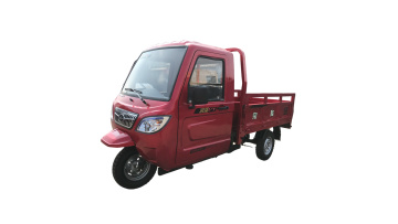 A tricycle with a cab for easy transportation