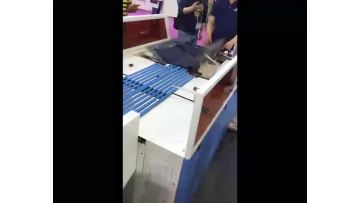 economical folding and bagging machine for blue t-shirts