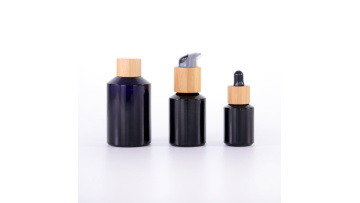 Black glass oblique shoulder bottle and bamboo wood accessories