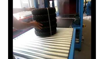 Automatic inline front feeding sleeve sealer
