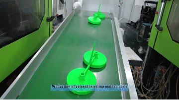 Production of colored injection molded parts