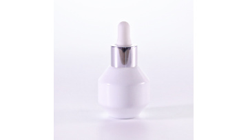 Special shape glass bottle with silver dropper