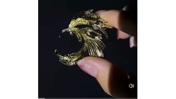 Phoenix metal brooch