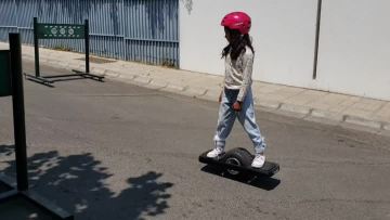 Children ride one wheel
