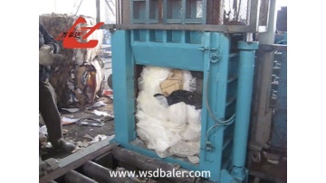 auto-belting baler