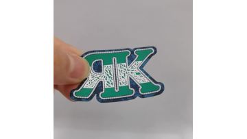 Sporty style woven layer silicone label