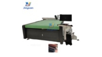 Automatic Fabric Spreading and Oscillating Knife Cutting Machine1