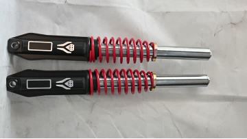 External spring shock absorber