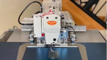 Industrial sewing machine.mp4