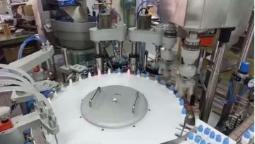 Eye drop filling and capping machine