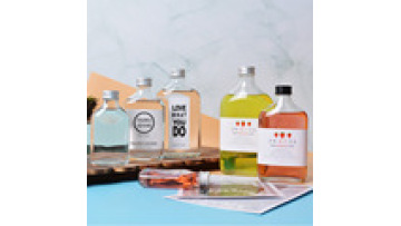 Popular Glass Bottle 50ml 100ml Oblique Shoulder Juice Drinking Cold Brew Coffee Bottle With Aluminum Lids1