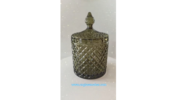 Embossed glass candle jar