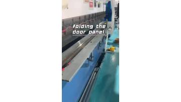 The machine bends the galvanized sheet