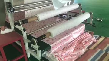 Roller transfer printing machine for roll cloth