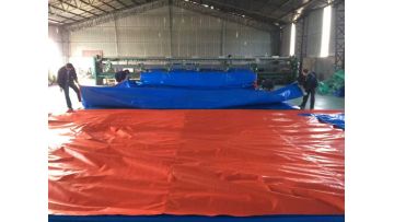 orange tarpaulin production