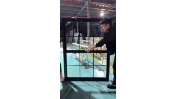Black double hung window with grill
