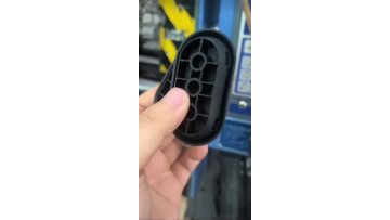 Injection molded black base for household appliances