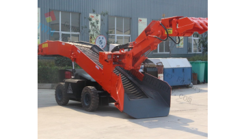 Crawler type mucking loader