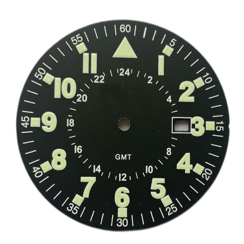 GMT watch dial with green lume