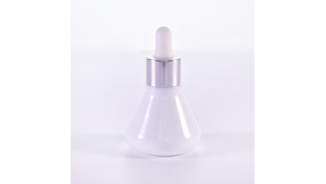 Special shape white serum bottle with silver dropper
