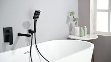 Black tub faucet with handheld shower