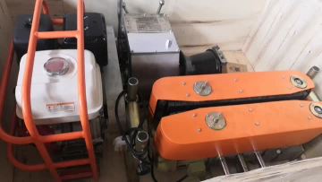 Cable pulling winch and cable feeder delivered