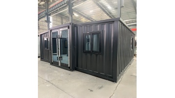 New expandable container house with corrugated panel exterior and a complete drainage system.