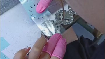 UP sticker on Watch dial